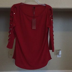 Red Cut out arms top.